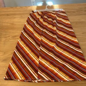 Brand new A line midi skirt. Very retro, super cute in the summer. Very light